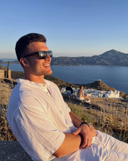 A handsome man wearing sunglasses