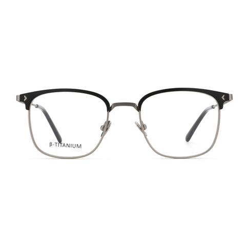 Zenottic Quetzal eyeglasses with a black upper frame and silver B-Titanium lower frame.