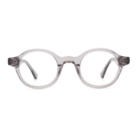 Zenottic Devon eyeglasses in translucent grey acetate with round frames and clear lenses.