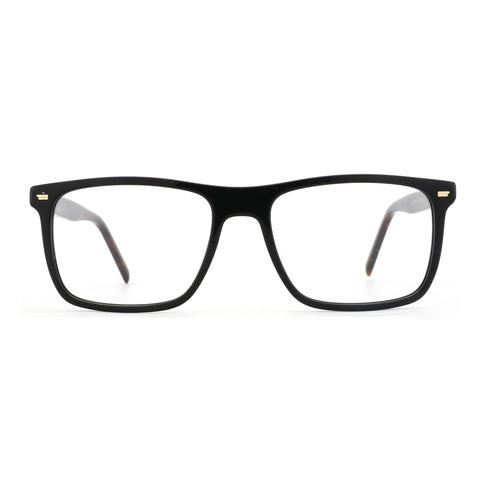 Zenottic Eyeglasses Bert in black acetate with gold accents and tortoiseshell temples.