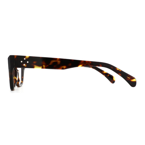 Zenottic Eyeglasses Lumi in brown tortoise shell acetate with silver rivets on the front.