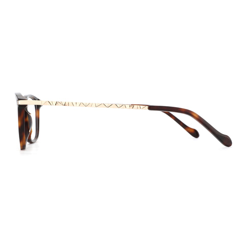 Zenottic Elara eyeglasses with tortoiseshell frames and gold temple accents.